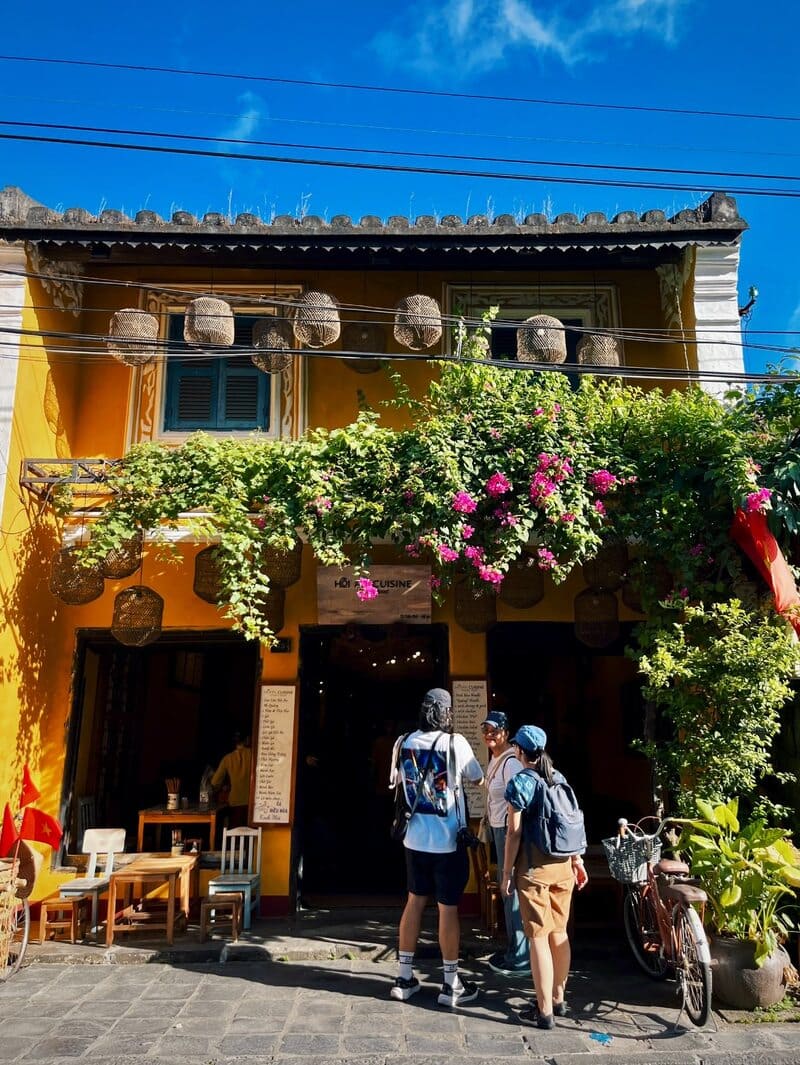 Hoi An's special feature is its iconic yellow houses and bright bougainvillea that adorn the facades