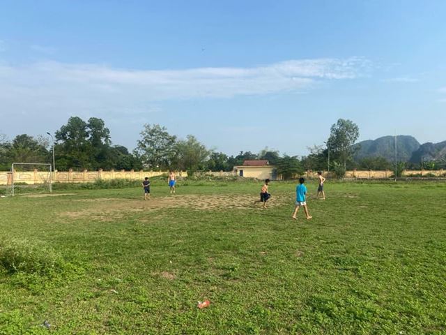 Play football with local children at Tam Coc (Halong Bay on land)